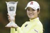 Japanese golfer Mone Inami holds the trophy after winning the LPGA's Japan Classic on Sunday, Nov. 5, 2023, at the Taiheiyo Club in Omitama city, Ibaraki prefecture, north central Japan.(Kyodo News via AP)