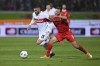 Heidenheim's Benedikt Gimber, left, and Stuttgart's Deniz Undav fight for the ball during the German Bundesliga soccer match between VfB Stuttgart and 1. FC Heidenheim at the Voith-Arena in Heidenheim, Germany, Sunday, Nov. 5, 2023. (Harry Langer/dpa via AP)