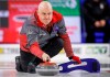 Team Northwest Territories skip Jamie Koe makes a shot against Team Nova Scotia at the Tim Hortons Brier in Lethbridge, Alta., Saturday, March 5, 2022. THE CANADIAN PRESS/Jeff McIntosh