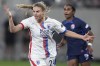 OL Reign forward Veronica Latsko, left, calls for the ball as San Diego Wave defender Naomi Girma defends during the first half of an NWSL semifinal playoff soccer match Sunday, Nov. 5, 2023, in San Diego. (AP Photo/Gregory Bull)