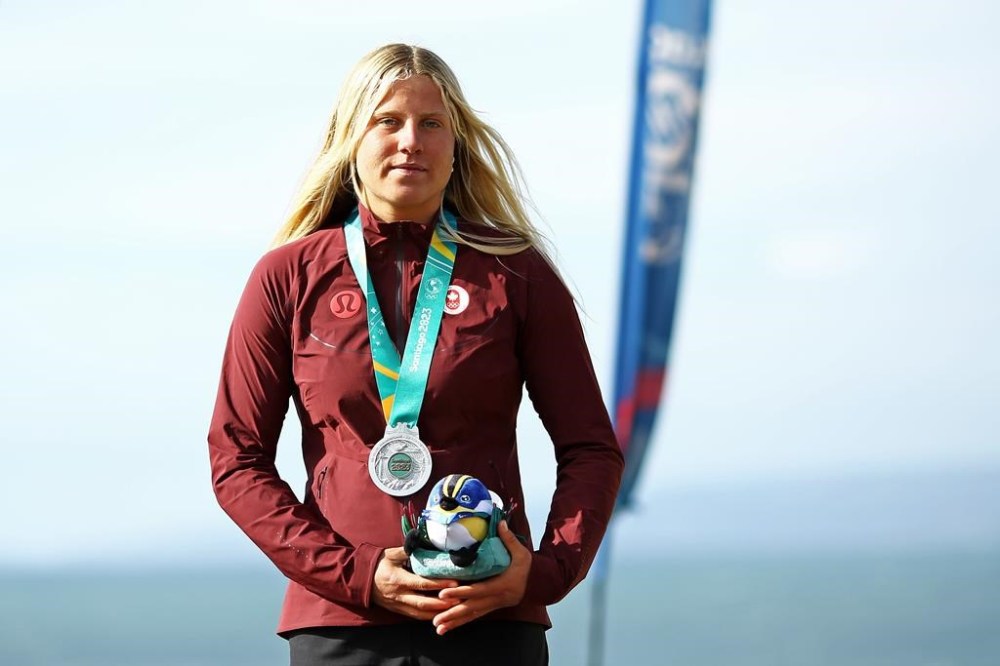 Sanoa Dempfle-Olin of Canada stands on the podium after winning the silver medal in women's shortboard surfing, during the Santiago 2023 Pan American Games on Monday, Oct.30, 2023 in Punta de Lobos, Chile.The athletes who have their literal golden ticket to next summer’s Olympic Games in Paris from the Pan American Games plan to make the most of it. THE CANADIAN PRESS/HO-Pan Am Games-Heuler Andrey **MANDATORY CREDIT**