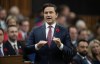 Conservative leader Pierre Poilievre rises during Question Period, Thursday, November 2, 2023 in Ottawa. Members of Parliament will vote today on a motion from the federal Conservatives about whether the Liberal government should lift its carbon levy on all forms of home heating, and not just apply it to those who use oil. THE CANADIAN PRESS/Adrian Wyld