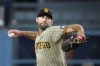 FILE - San Diego Padres starting pitcher Michael Wacha throws to the plate during the first inning of a baseball game against the Los Angeles Dodgers, Sept. 12, 2023, in Los Angeles. The Padres on Monday, Nov. 6, declined their two-year, $32 million option on right-hander Wacha, who then declined his one-year, $6.5 million option and became a free agent. (AP Photo/Mark J. Terrill, File)
