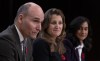 Deputy Prime Minister and Minister of Finance Chrystia Freeland and President of the Treasury Board Anita Anand look on as Public Services and Procurement Minister Jean-Yves Duclos speaks during a news conference, Tuesday, November 7, 2023 in Ottawa. THE CANADIAN PRESS/Adrian Wyld