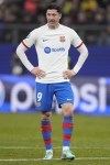 Barcelona's Robert Lewandowski during the Champions League Group H soccer match between Shakhtar Donetsk and Barcelona, at the Volksparkstadion in Hamburg, Germany, Tuesday, Nov. 7, 2023. (AP Photo/Matthias Schrader)