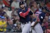 Boston Red Sox's Wilyer Abreu is congratulated by third base coach Carlos Febles (53) after hitting a two-run home run during the second inning of a baseball game against the Houston Astros, Thursday, Aug. 24, 2023, in Houston. (AP Photo/Kevin M. Cox)