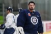 Winnipeg Jets goaltender Connor Hellebuyck (37) during opening day of their NHL training camp in Winnipeg, Thursday, Sept. 21, 2023. THE CANADIAN PRESS/John Woods
