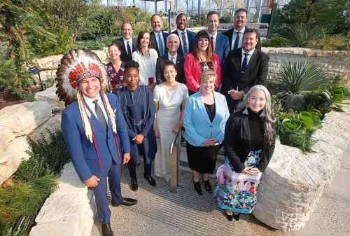 Manitoba Premier Wab Kinew, left, and his cabinet. (John Woods / The Canadian Press)