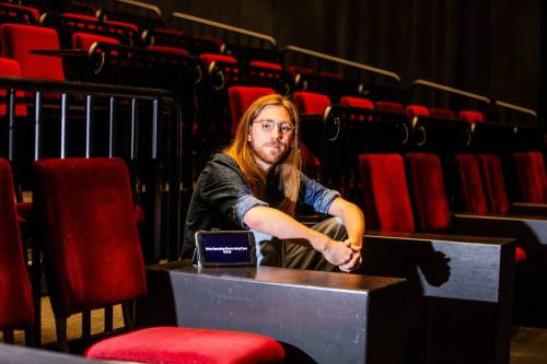 Photos by MIKAELA MACKENZIE / WINNIPEG FREE PRESS
                                Jack Maier translates French scripts into English for live performances so audience members can read along with the dialogue.