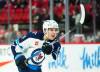 Winnipeg Jets defenceman Ville Heinola (14) takes a shot on net while taking on the Ottawa Senators in first period pre-season NHL hockey action in Ottawa on Friday, Sept. 29, 2023. (Sean Kilpatrick / The Canadian Press files)