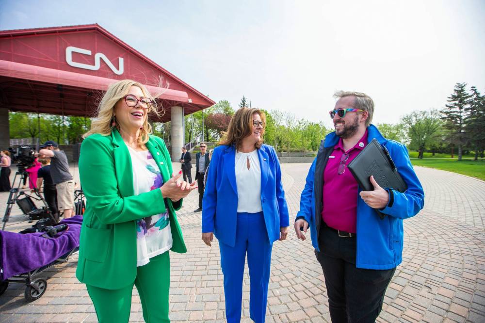 MIKAELA MACKENZIE / WINNIPEG FREE PRESS FILES
Rochelle Squires, left, in her former political life as families minister and minister responsible for gender equity, with former premier Heather Stefanson, and president of Pride Winnipeg Barry Karlenzig at an announcement about Pride funding at The Forks on May 23.