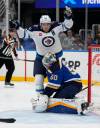 Jeff Roberson / The Associated Press
                                Mark Scheifele celebrates Tuesday after scoring against St. Louis Blues goalie Jordan Binnington in the first period of the Jets’ 5-2 victory.