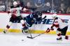 Fred Greenslade / The Canadian Press
                                A big hit courtesy of the Devils Jonas Siegenthaler did nothing to slow down Jets forward Cole Perfetti, who had a goal and an assist Tuesday.