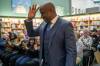 BROOK JONES / WINNIPEG FREE PRESS
                                Donovan Bailey waves to the audience Wednesday at Winnipeg launch of his memoir, Undisputed: A Champions Life at McNally Robinson Bookellers.