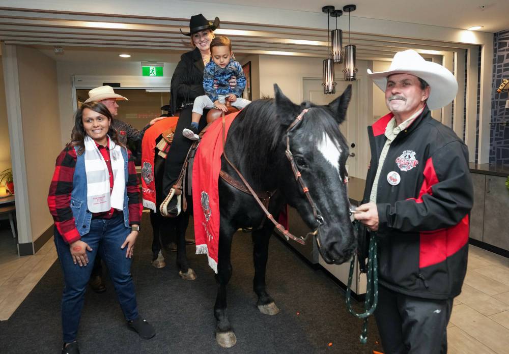 Nathan Denette / THE CANADIAN PRESS
Calgary Stampeders fans riding a horse into the lobby of a hotel in the host city is one the great traditions of Grey Cup week.