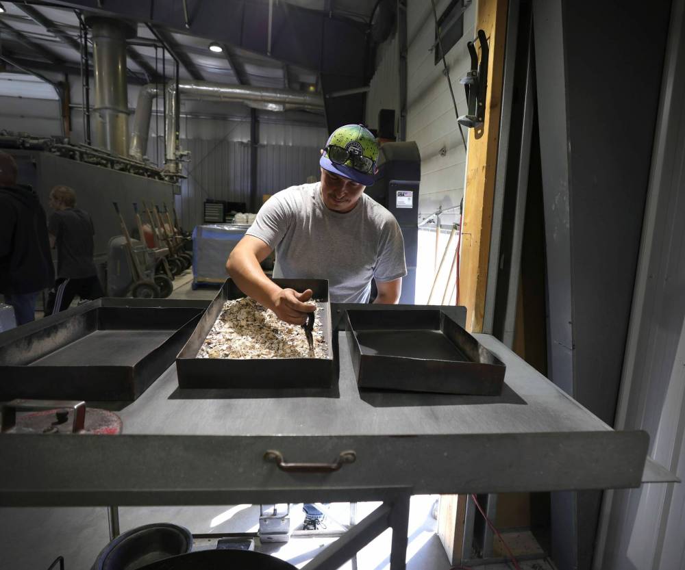 RUTH BONNEVILLE / WINNIPEG FREE PRESS
                                A Precious Pet Cremation worker  with some of the tools of the pet-cremation trade.