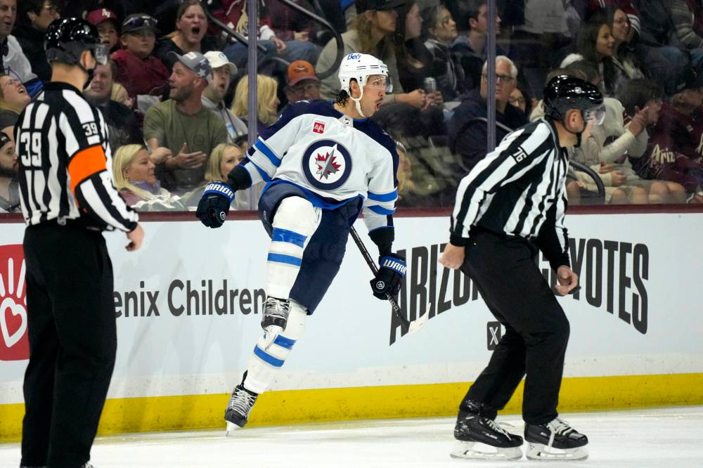 (AP Photo/Ross D. Franklin / The Associated Press files
Jets defenceman Brenden Dillon (above) helped prepare Gabriel Vilardi for his return the game action with a bit of body contact during practice on Tuesday.