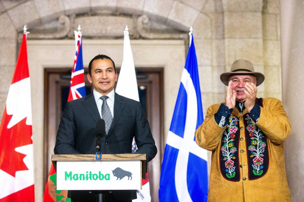 MIKAELA MACKENZIE / WINNIPEG FREE PRESS
Premier Wab Kinew (left) and MMF president David Chartrand announced the introduction of legislation naming Louis Riel as the honorary first premier of Manitoba at the legislative building on Thursday.