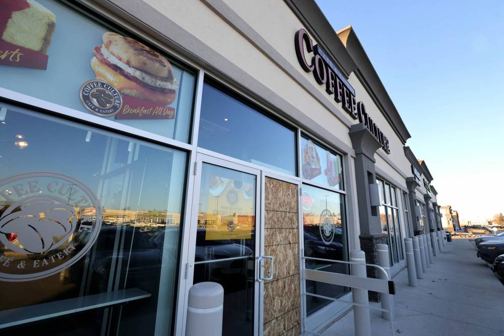 RUTH BONNEVILLE / WINNIPEG FREE PRESS
Coffee Culture’s front-door glass was smashed in Thursday’s break-in.