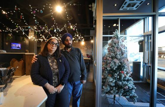 Sandeep Mehendiratta and her husband Paramjeet Singh, owners of Coffee Culture, which has been hit twice by the same thief. (Ruth Bonneville / Winnipeg Free Press)