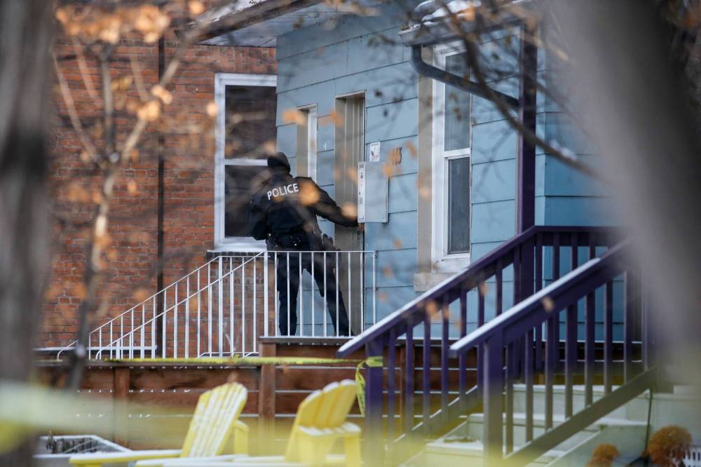 JOHN WOODS / WINNIPEG FREE PRESS Police say there were multiple fatalities in a violent incident on Langside Street early Sunday morning.