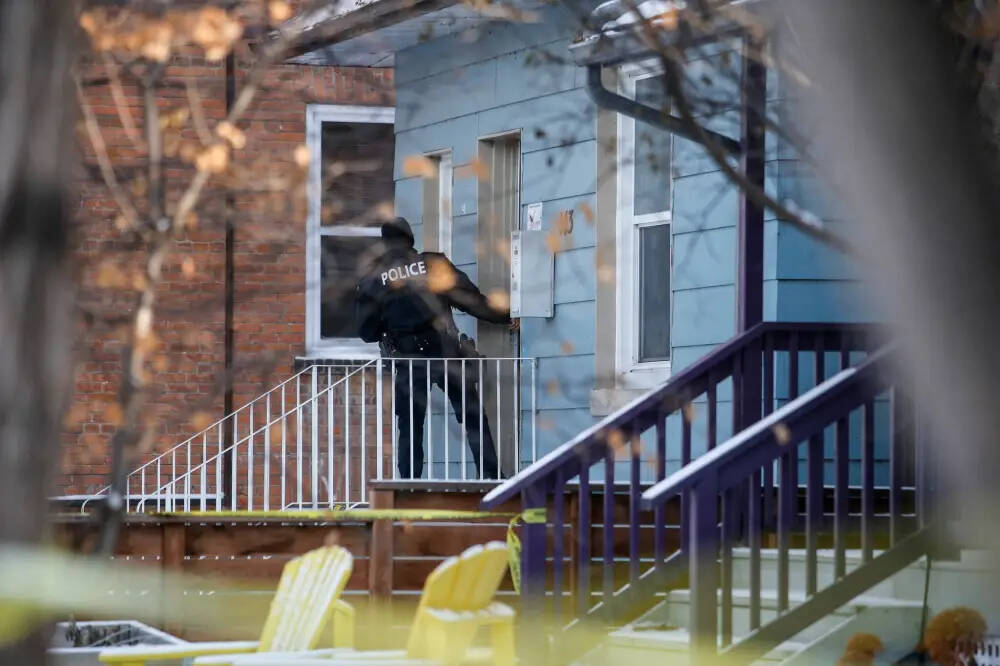 Police say the residence where four people were shot and killed has been called to occasionally for service in the last couple years. (John Woods / Winnipeg Free Press)