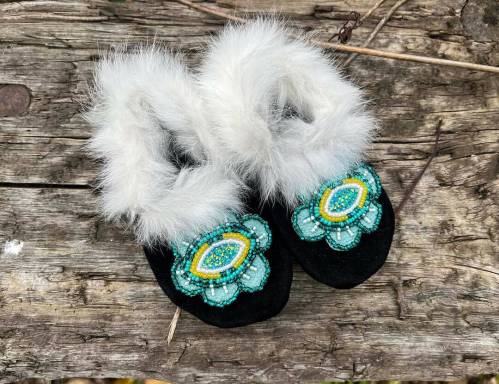 Supplied
                                All proceeds from sales at Women Helping Women Beadwork goes to the crafters.