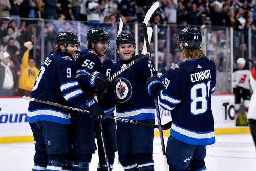 Fred Greenslade / THE CANADIAN PRESS FILES
                                Success on the ice hasn&rsquo;t led to fans in the stands this season for the Winnipeg Jets.