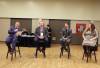 Swan River Mayor Lance Jacobson (left) introduces panellists for a discussion on short-term rentals at the second day of the Association of Manitoba Municipalities at Brandon’s Keystone Centre on Wednesday morning. He was joined by Municipality of Harrison Park Reeve Ian Drul (centre-left), Manitoba Hotel Association president Michael Juce (centre-right) and Airbnb policy director Alex Howell (right). (Colin Slark / The Brandon Sun)