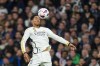 Real Madrid's Jude Bellingham heads the ball during a Spanish La Liga soccer match between Real Madrid and Rayo Vallecano at the Santiago Bernabeu stadium in Madrid, Spain, Sunday, Nov. 5, 2023. (AP Photo/Manu Fernandez)