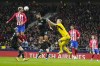 Atletico Madrid's Antoine Griezmann, left, scores his side's third goal during the Champions League Group E soccer match between Atletico Madrid and Celtic at the Metropolitano stadium in Madrid, Spain, Tuesday, Nov. 7, 2023. (AP Photo/Jose Breton)