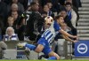 Brighton's Joel Veltman, right, challenges for the ball with Ajax's Steven Bergwijn during the Europa League Group B soccer match between Brighton and Hove Albion and Ajax at the Amex stadium in Brighton, England, Thursday, Oct. 26, 2023. (AP Photo/Frank Augstein)