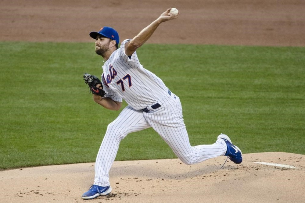 FILE - New York Mets' David Peterson delivers a pitch during the first inning of a baseball game against the Miami Marlins Saturday, Aug. 8, 2020, in New York. Peterson is projected to miss the start of next season following surgery to repair a torn labrum in left hip. New York said Tuesday, Nov. 7, that Peterson had the operation on Monday at the Hospital for Special Surgery. (AP Photo/Frank Franklin II, File)
