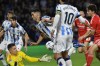Real Sociedad's Mikel Merino, center, uses his hand to score, before the goal was disallowed goal, during a Group D Champions League soccer match between Real Sociedad and Benfica at the Reala Arena stadium in San Sebastian, Spain, Wednesday, Nov. 8, 2023. (AP Photo/Alvaro Barrientos)