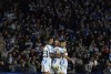 Real Sociedad's Mikel Merino, center, celebrates with teammates after scoring the opening goal of his team during a Group D Champions League soccer match between Real Sociedad and Benfica at the Reala Arena stadium in San Sebastian, Spain, Wednesday, Nov. 8, 2023. (AP Photo/Alvaro Barrientos)