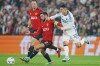 FC Copenhagen's Mohamed Elyounoussi, right, and Manchester United's Bruno Fernandes, left, challenge for the ball during the Champions League Group A soccer match between FC Copenhagen and Manchester United in Copenhagen, Denmark, Wednesday, Nov. 8, 2023. (Liselotte Sabroe/Ritzau Scanpix via AP)