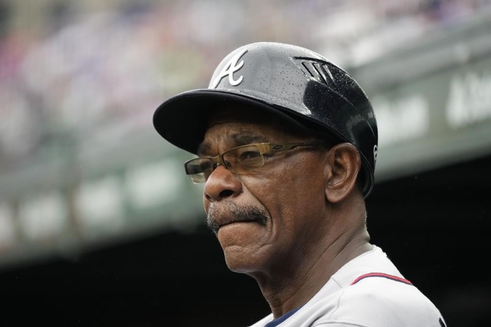 FILE - Atlanta Braves third base coach Ron Washington watches players during the first inning of a baseball game against the Chicago Cubs in Chicago, Sunday, Aug. 6, 2023. The Los Angeles Angels have hired Washington to be their new manager. The 71-year-old Washington managed the Texas Rangers from 2007-14, winning two AL pennants and going 664–611. He spent the past seven seasons as Atlanta’s third base coach, helping the Braves to their 2021 World Series title. (AP Photo/Nam Y. Huh, File)
