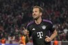 Bayern's Harry Kane, centre, celebrates after scoring his side's second goal during the Champions League group A soccer match between Bayer Munich and Galatasaray at the Allianz Arena stadium in Munich, Germany, Wednesday, Nov. 8, 2023. (AP Photo/Matthias Schrader)