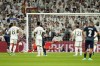 Real Madrid's goalkeeper Andriy Lunin makes a save penalty in front of Braga's Alvaro Djalo, left, during the Champions League Group C soccer match between Real Madrid and Braga at the Santiago Bernabeu stadium in Madrid, Spain, Wednesday, Nov. 8, 2023. (AP Photo/Jose Breton)