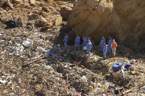 FILE - Rescue teams look for flash flood victims in the city of Derna, Libya, Monday, Sept. 18, 2023. The last 12 months were the hottest Earth has ever recorded, according to a new report Thursday, Nov. 9, by Climate Central, a nonprofit science research group. (AP Photo/Yousef Murad, File)