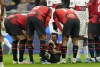 AC Milan's Christian Pulisic reacts after getting injured during the Champions League group F soccer match between AC Milan and Paris Saint Germain at the San Siro stadium in Milan, Italy, Tuesday, Nov. 7, 2023. (AP Photo/Antonio Calanni)