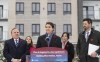 Prime Minister Justin Trudeau, centre, makes a housing announcement with Quebec Premier Francois Legault, left, in Longueuil, Que., Thursday Nov. 9, 2023. The federal government announced $900-million federal contribution over the next four years to accelerate housing construction in Quebec. THE CANADIAN PRESS/Christinne Muschi