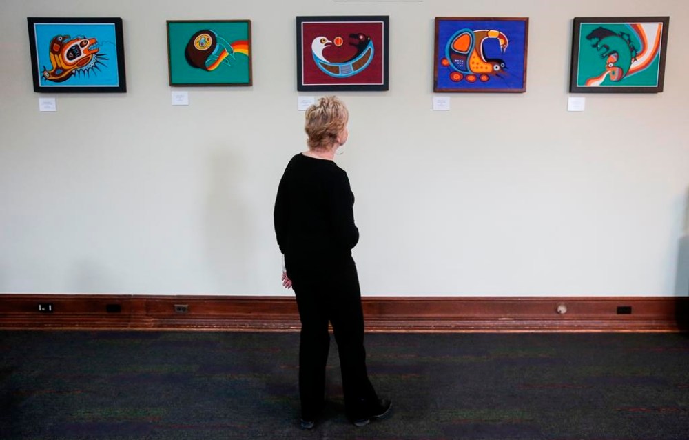 Former Speaker of the Manitoba Legislature Myrna Driedger is photographed as she looks at some Jackson Beardy pieces in the new Indigenous art exhibit at the Manitoba Legislature in Winnipeg Thursday, Nov, 9, 2023. THE CANADIAN PRESS/John Woods