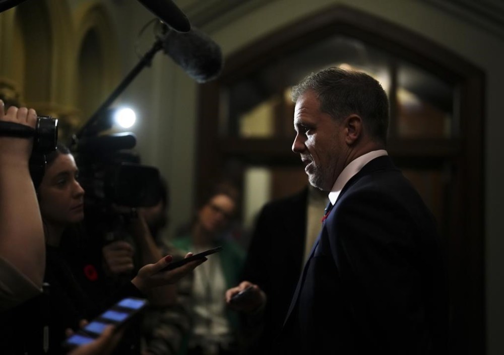 Health Minister Mark Holland arrives to a cabinet meeting on Parliament Hill in Ottawa on Tuesday, Nov. 7, 2023. Holland says his department will consult with provincial dental associations that complain of being left in the dark about the new federal dental plan, but only if they sign a confidentiality agreement. THE CANADIAN PRESS/Sean Kilpatrick