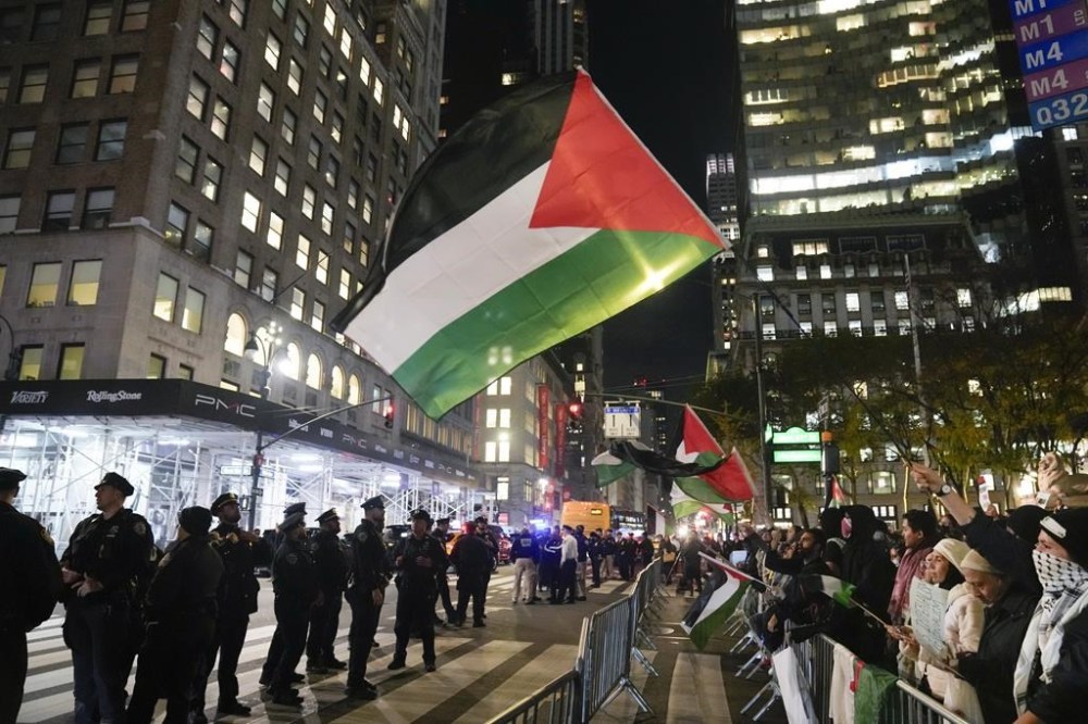 Protesters stage sit-in at New York Times headquarters to call for ...