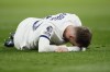 Tottenham's James Maddison lies on the pitch in pain during the English Premier League soccer match between Tottenham Hotspur and Chelsea, at Tottenham Hotspur Stadium, London, Monday, Nov. 6, 2023. (AP Photo/David Cliff)