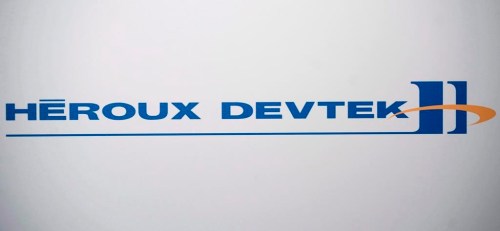 Aircraft parts maker Heroux-Devtek Inc. says it earned $4.6 million in its latest quarter, down from $4.8 million in the same quarter last year, as its revenue rose nearly seven per cent. A Heroux Devtek logo is shown at the company's annual general meeting in Montreal, Thursday, Aug. 2, 2012. THE CANADIAN PRESS/Graham Hughes