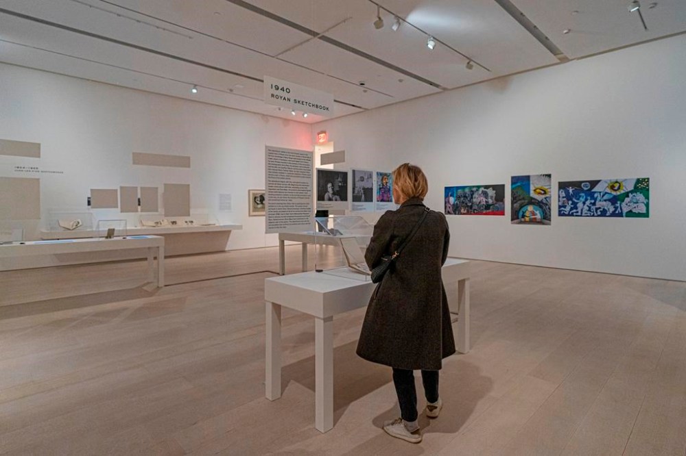 A woman observes part of the Picasso: 14 Sketchbooks exhibit at Pace Gallery in New York, Thursday, Nov. 9, 2023. (AP Photo/Peter K. Afriyie)