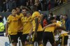 Wolverhampton Wanderers' Mario Lemina celebrates with teammates after scoring his side's second goal during the English Premier League soccer match between Wolverhampton Wanderers and Tottenham, at the Molineux Stadium, in Wolverhampton, England, Saturday, Nov. 11, 2023. (AP Photo/Rui Vieira)