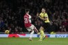 Arsenal's Fabio Vieira, right, fouls Burnley's Josh Brownhill during the English Premier League soccer match between Arsenal and Burnley at Emirates stadium in London, England, Saturday, Nov. 11, 2023. (AP Photo/Kin Cheung)